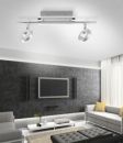 Moderne LED-Deckenleuchte im Wohnzimmer mit grauer Couch, TV und stilvoller Wanddekoration.